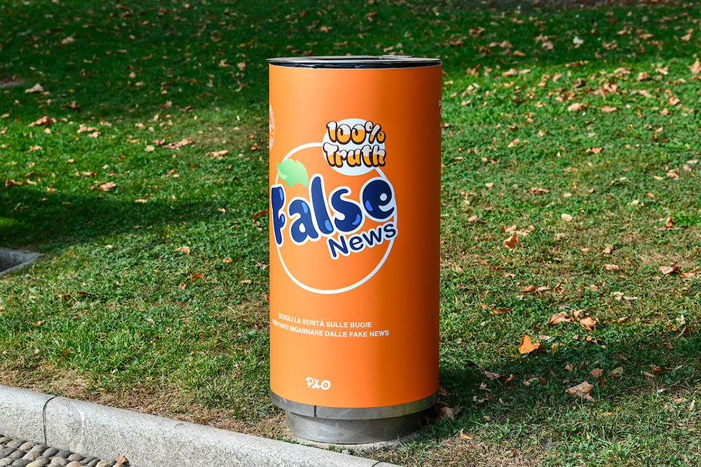 subvertising cans by Pao in public bins for Freedom of Information in support of Assange Fanta