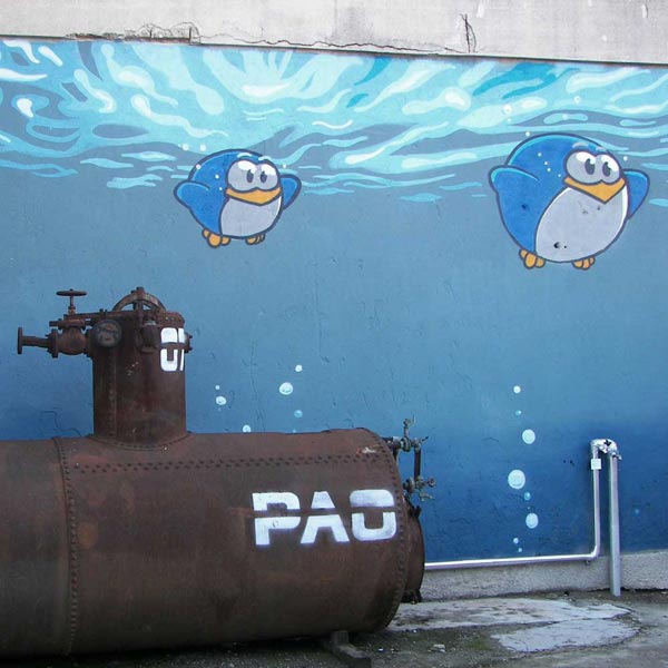 An old tank transformed in a submarine. Street art by Pao