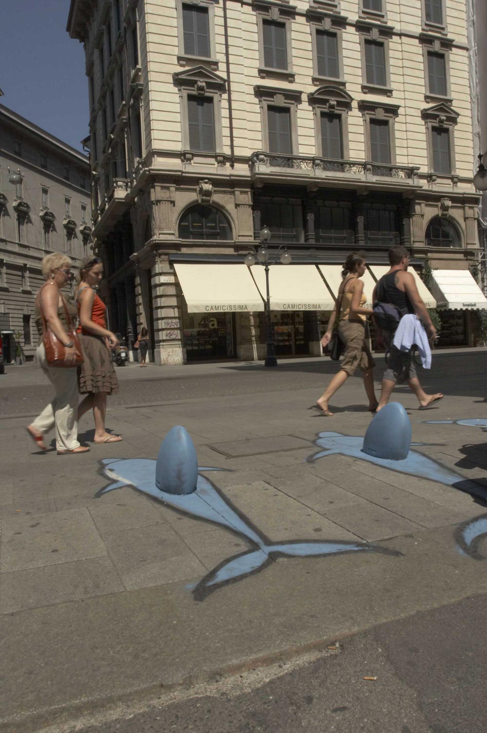 Dolphins painted on street furniture